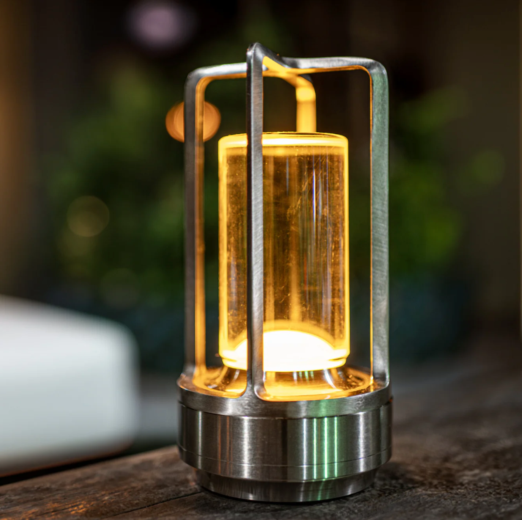 Wireless LumiLight table lamp by My Store, water-resistant, portable, stylish lighting with dimming functionality displayed on screen.